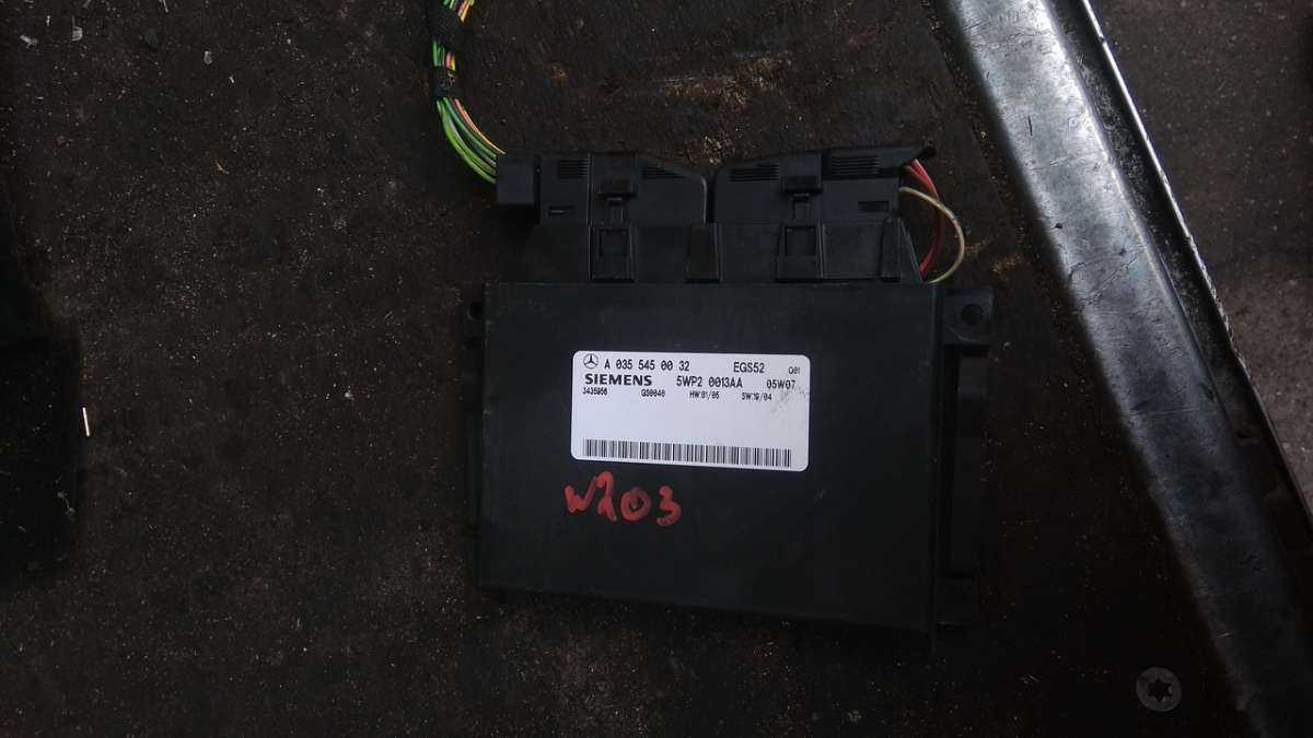 Где находиться блок управления акпп мерседес w203